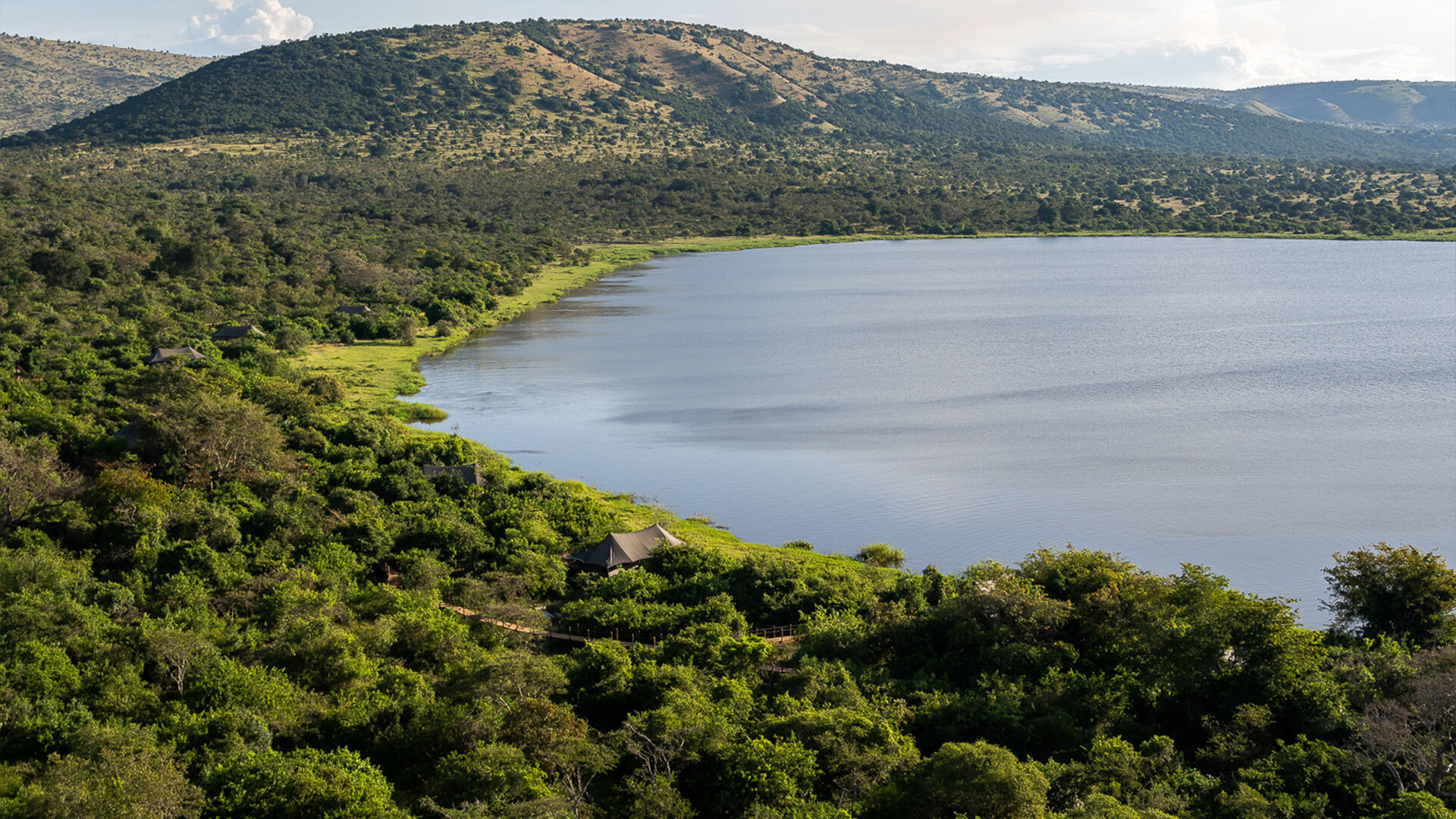 Aerial view of a lake and forest in Akagera National Park