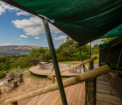 A wilderness view from a wooden deck at the Karenge Bush Camp.